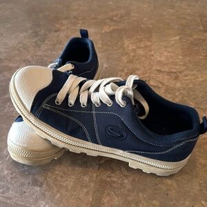 Navy blue sketchers tennis shoes. Size 9.5 like new